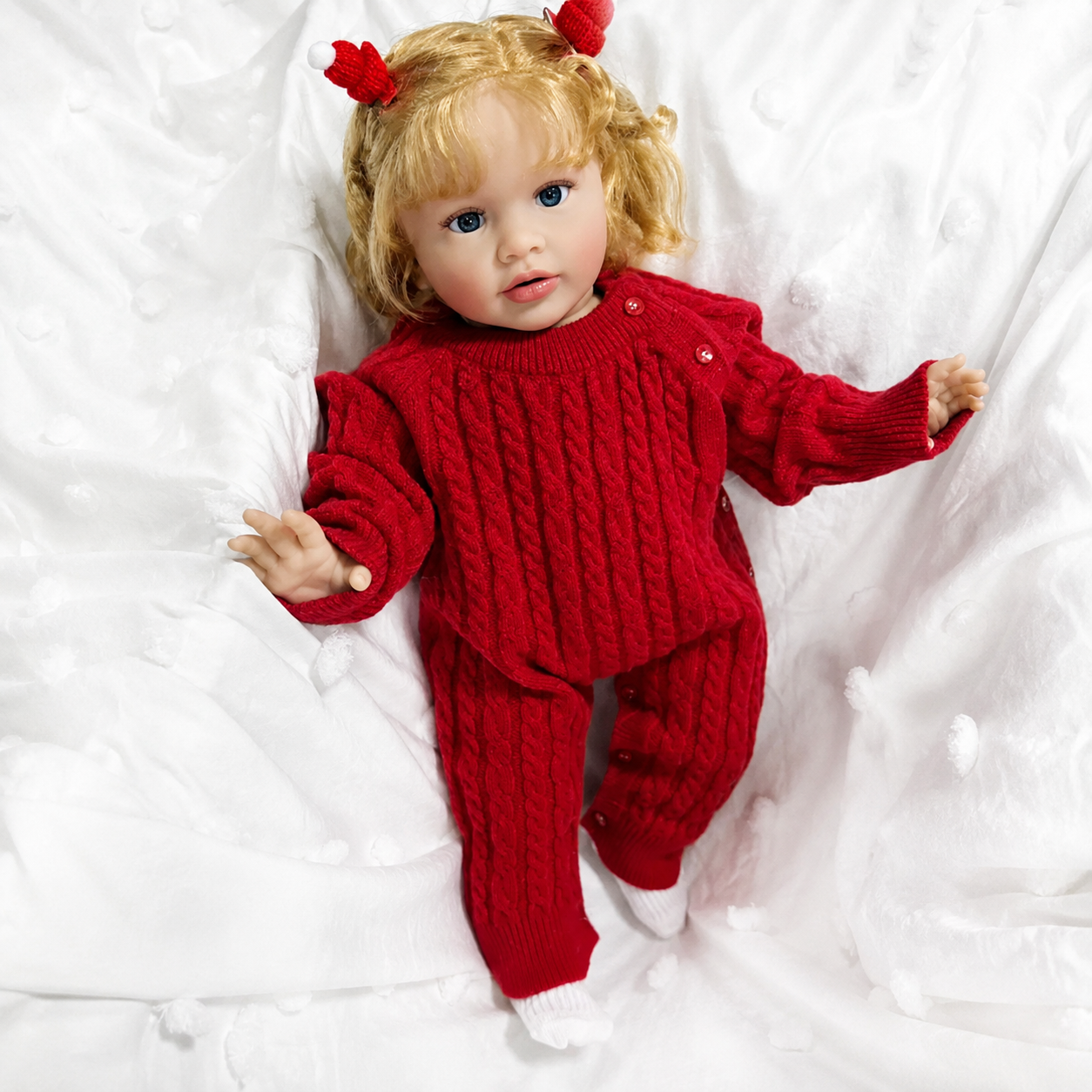 Blossom – 25 Zoll lebensechte Reborn-Kleinkind-Mädchenpuppe mit blonden Locken